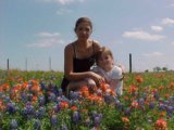 Me, my youngest, indian paintbrushes and bluebonnets in east Tx 05/05