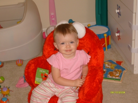 Madison in her elmo chair