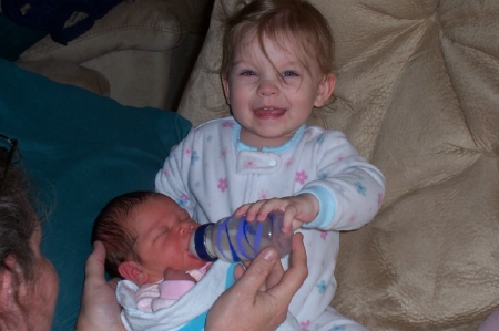 Addison Feeding her sister Kaitlin
