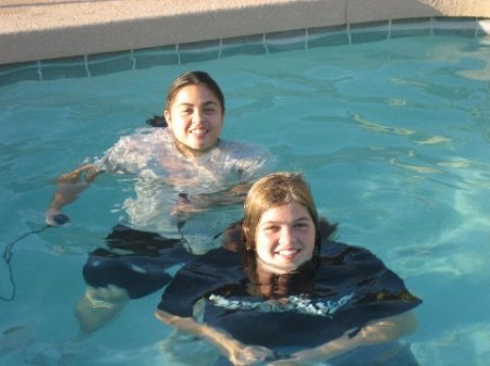 MY GIRLS AT HOME IN THE POOL.......