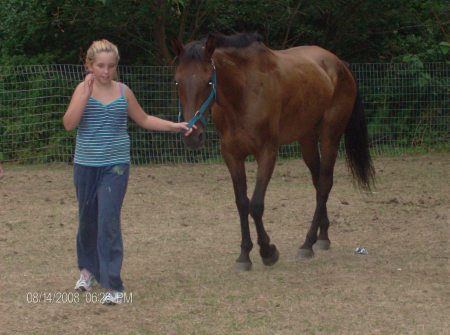 My daughter Julia with our horse Lily