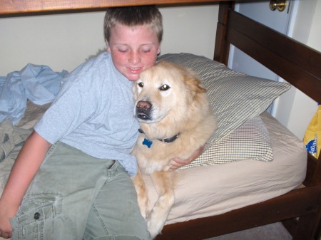 My youngest son Bryan 10yrs with our dog Skip