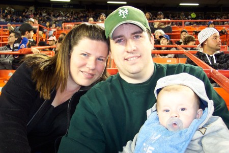 My grandson Kevin with his mom and dad at Mets