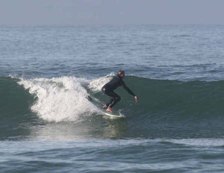 I like surfing most in the early morning