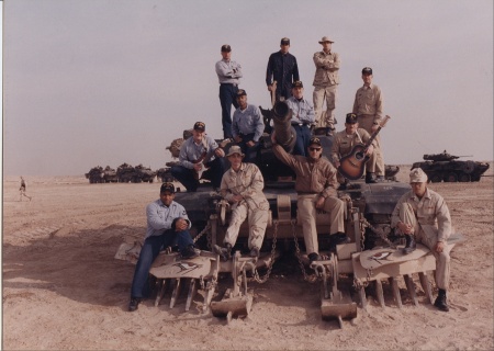 ON TOP A1 ABRAHAMS TANK WITH MARINES