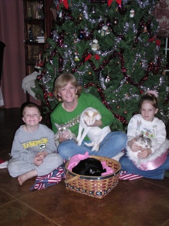 Hailey, Blake, and mom posing with all 4 cats! WOW!!