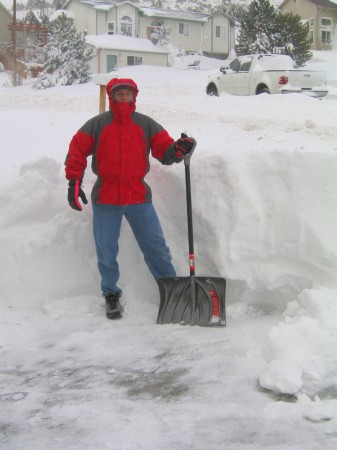 Mike Shoveling snow in driveway December 2003