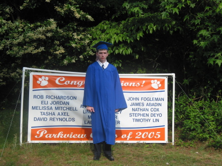 Nathan at Graduation Banner