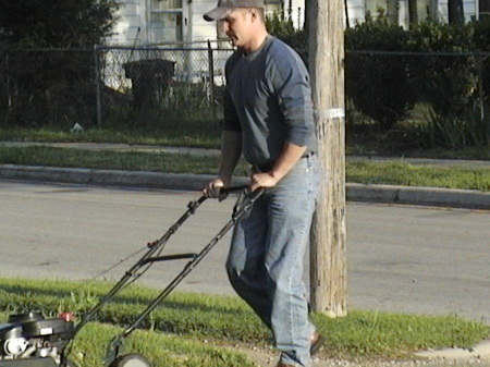 My Son mowing my yard