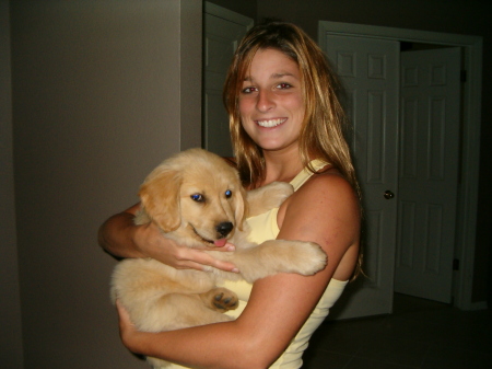 Danielle with our puppy golden "Trey" 2005