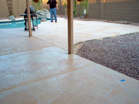 Working on the back deck floor treatment