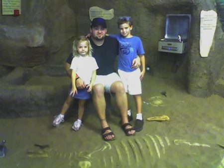 kiddos and myself at a dinosaur museum.