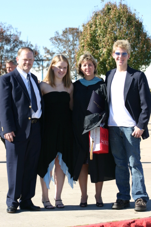 My family at my wife's Master Degree graduation in 2004