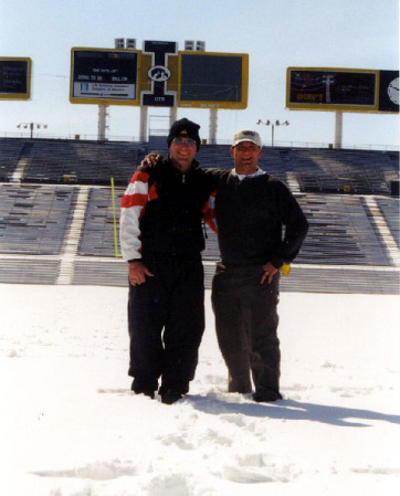Brother, Aaron and me on the football field at the University of Iowa (attending the 2000 NCAA Division 1  Wrestling Championships)