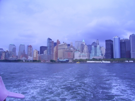 new york skyline from ferry to ellis island