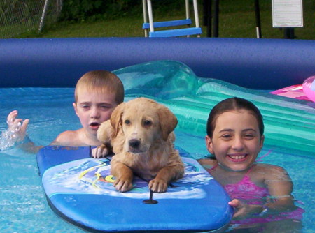 Ally and Josh in the pool with her dog(she has at her Dad's)