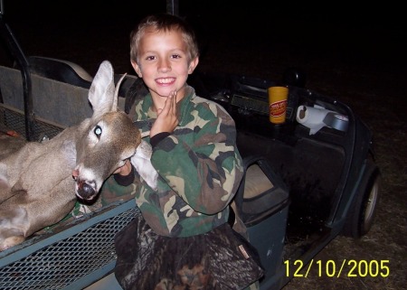 My nephew, Joshua and his first buck.