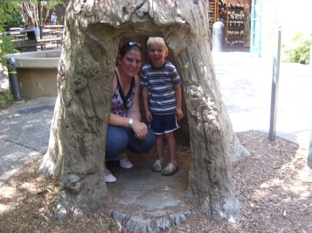 Carter and I in a tree trunk