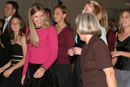 Kenny girls dancing with the groom and teacher.