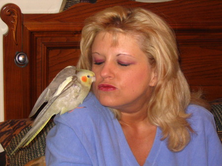 Me and my bird Cassie - she has a non-stop personality - like her owner - LOL