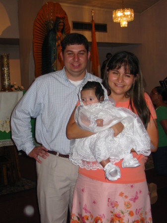 Me, myhusband, and Eva at her baptism