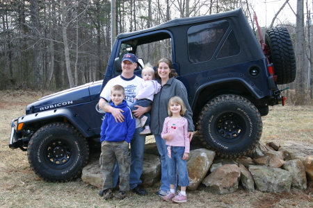 The family in front of Damon's Jeep Rubicon