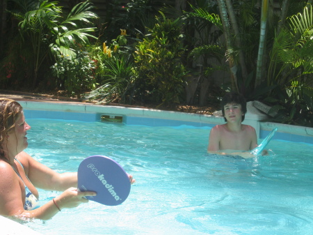 my stepson, Jeremy & Heidi playing in the pool.