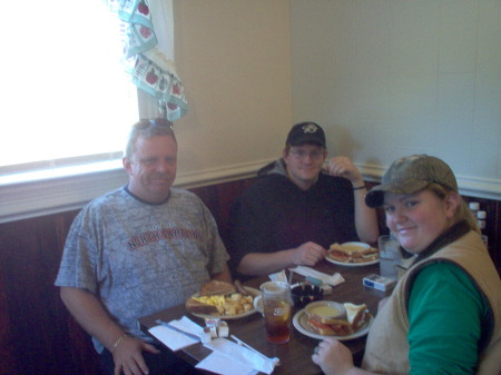 dean, dan  and sarah eating breakfast