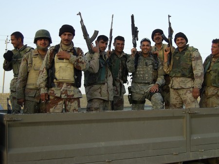 My Younger brother David (In the middle with his shades on his head) (Iraq 2006)
