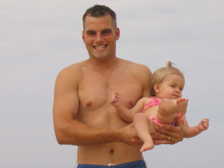 My stud husband Aric and our daughter Sidney Summer 05