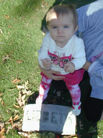 Gina at Lizzie Borden's Grave marker