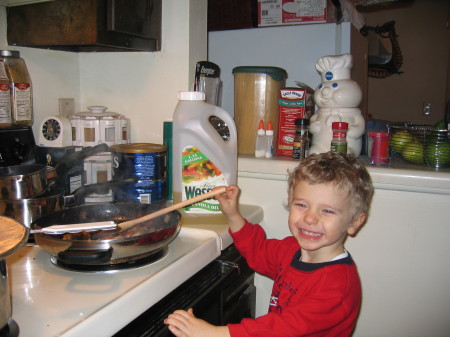 my son brandon helping mom cook