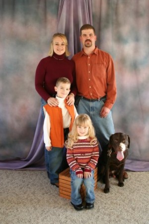 The complete Family...can't have a portrait without the family dog.