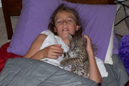 Hunter, our bobcat with our daughter Rachel