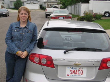 New car, plate and hair