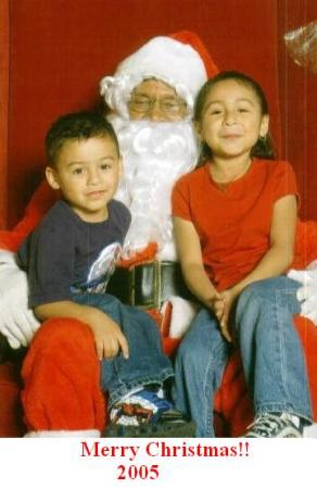 Marissa & Angel Alvarez W/Santa (so they think)