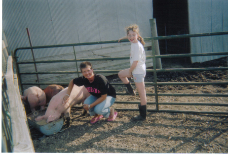 Heather, Kristen and Bubba the pig