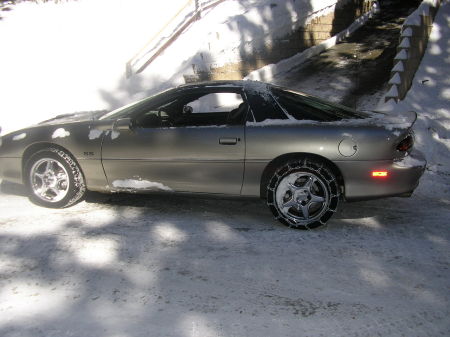 Our car in front of our house ready for the snow.