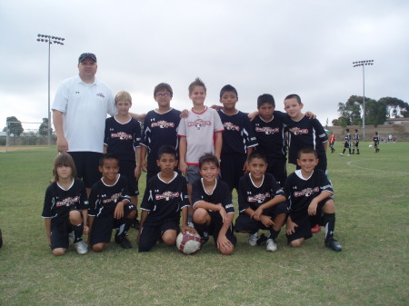 Preston 10 years old with Dad as Coach