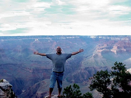 On the edge of a LOOOOONG drop at the Grand Canyon