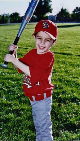 Curtis playing Tball spring 2005
