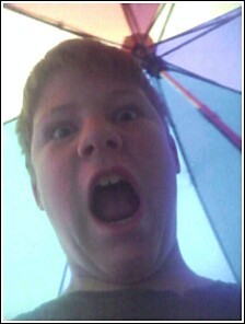 Stan under an umbrella