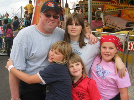 My husband and our 4 girls: Sept. '05