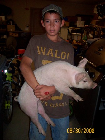 my son Charlie caught the greased pig