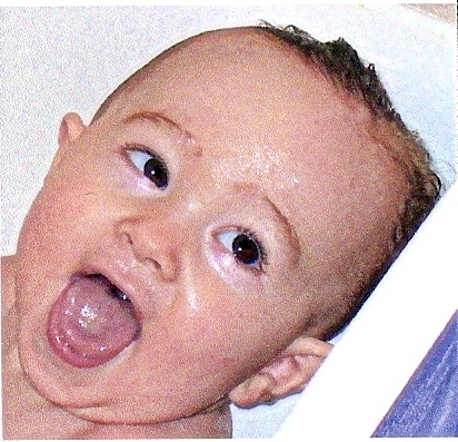 Benny bath laughing as baby