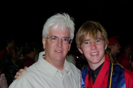 Me with my son at his grad