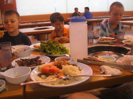 my boys enjoying eating korean food