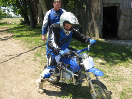 My son and his dirt bike