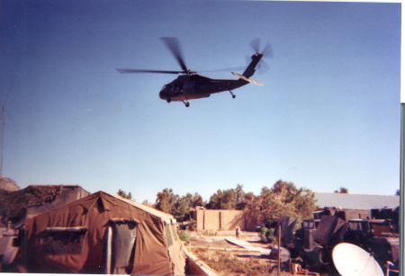 Another Blackhawk chopper bringing the wounded