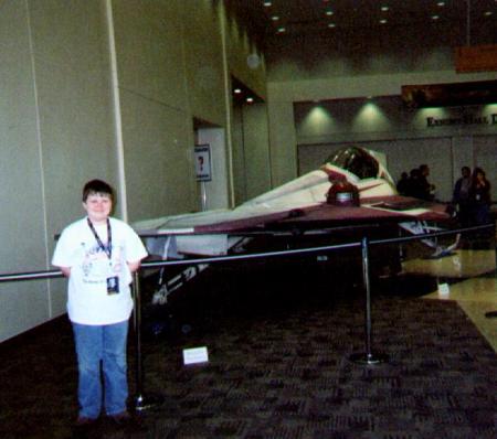 Cody standing by a starfighter